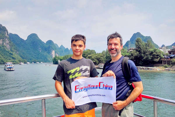 Family Taking Li River Cruise from Guilin to Yangshuo