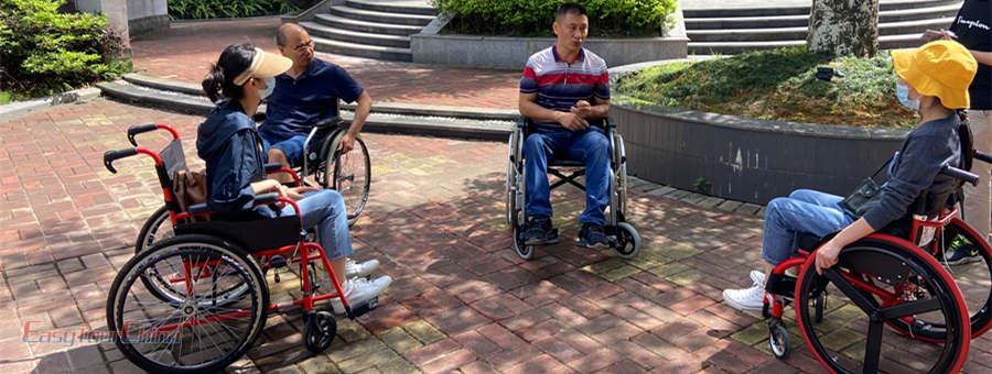 Easy Tour China team learn to use wheelchair