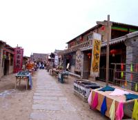 ancient street with wooden buildlings