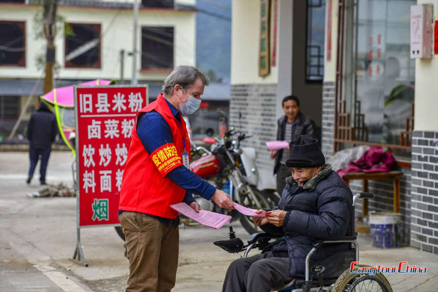 Ian with local people in Yangshuo during the coronavirus