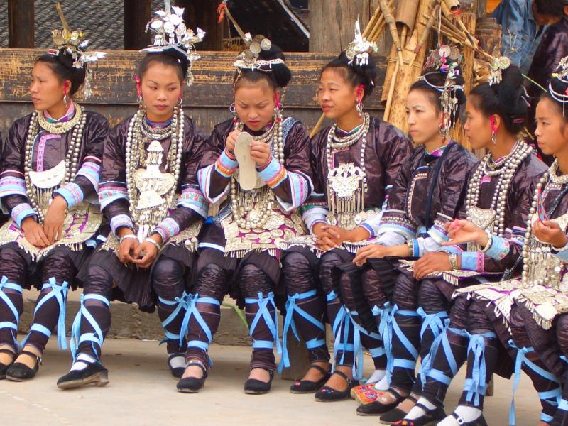 Dong girls dressed in traditional costumes during Dong's New Year Festival