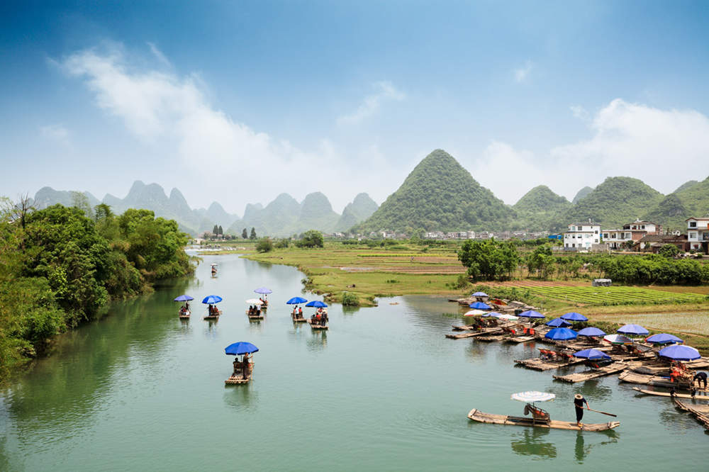 Take a bamboo rafting trip in Yangshuo