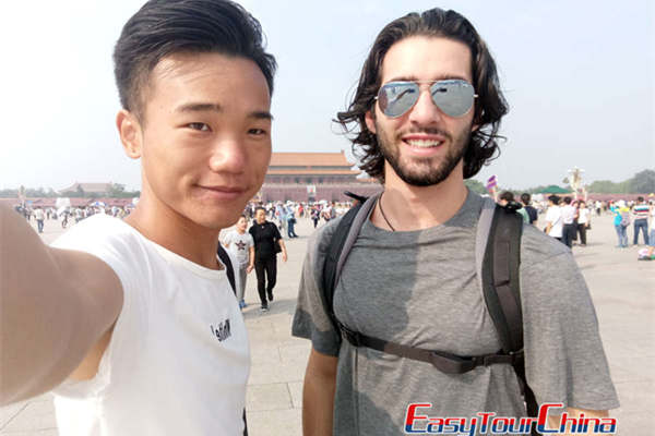Solo Traveler visiting Beijing Tiananmen Square with tour guide
