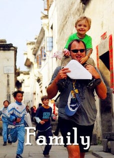 Family visiting an old town in China