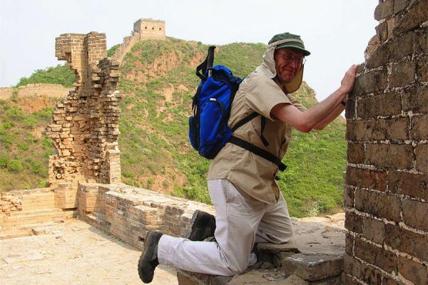 Senior hiking the Great Wall of China