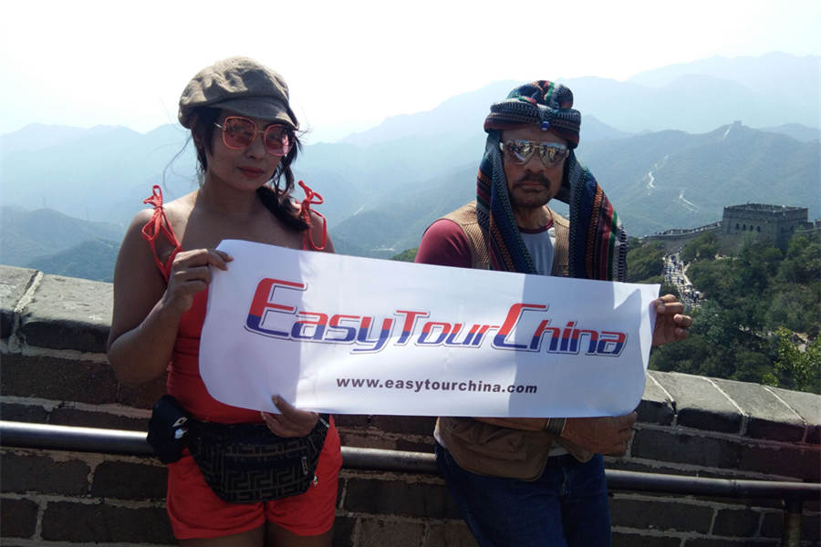 An Indian couple visit the Great Wall at Mutianyu section