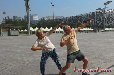 Elderly travelers visiting Beijing Bird Nest