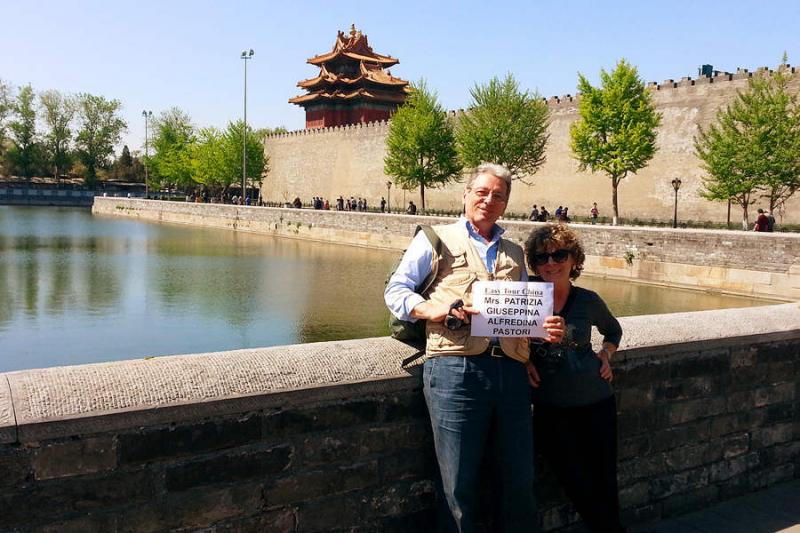 senior couple visit Forbidden City