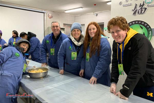 panda volunteers are make food for panda