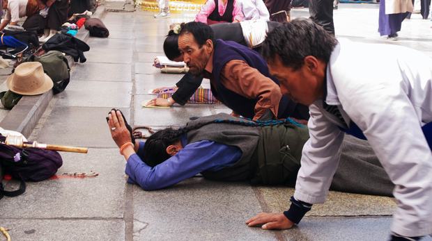 People pray before Dazhao Temple