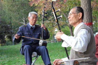Chinese Elders play music instrument Erhu