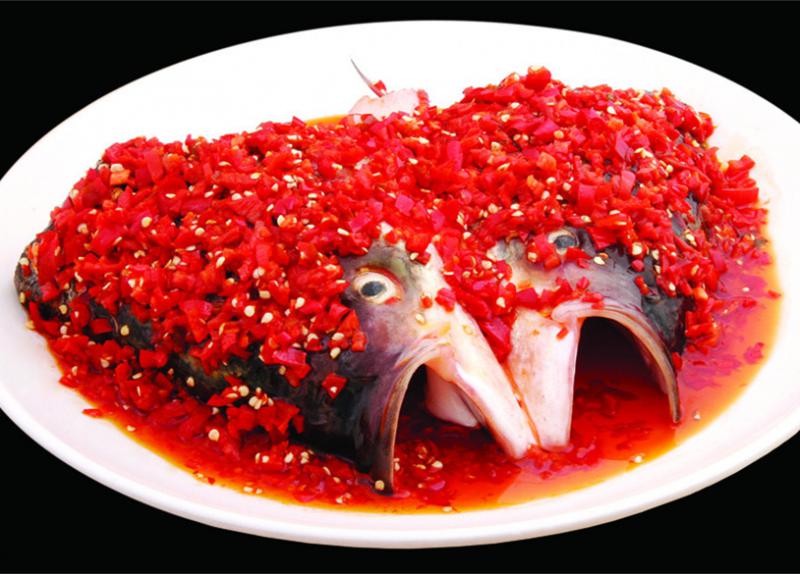 Steamed fish head with diced hot red peppers