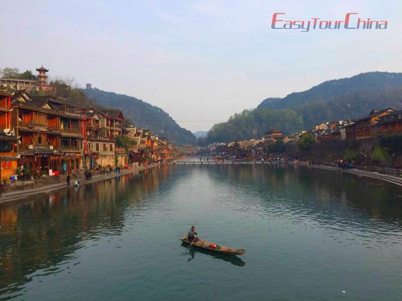 Boat Sailing on Tuo River in Phoenix Ancient City