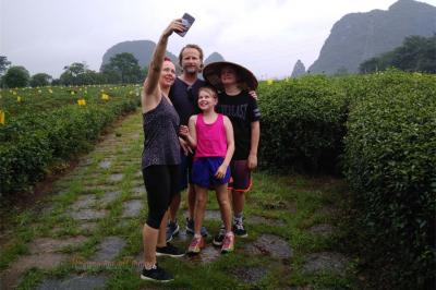 Australian family travel in China and take a selfie at a tea garden in Guilin