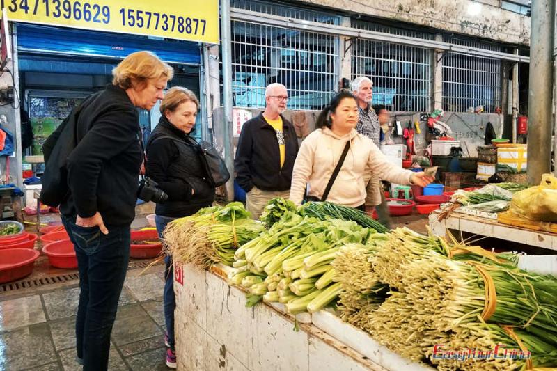 Senior people visit wet market