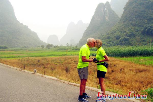 senior couple biking in Guilin China