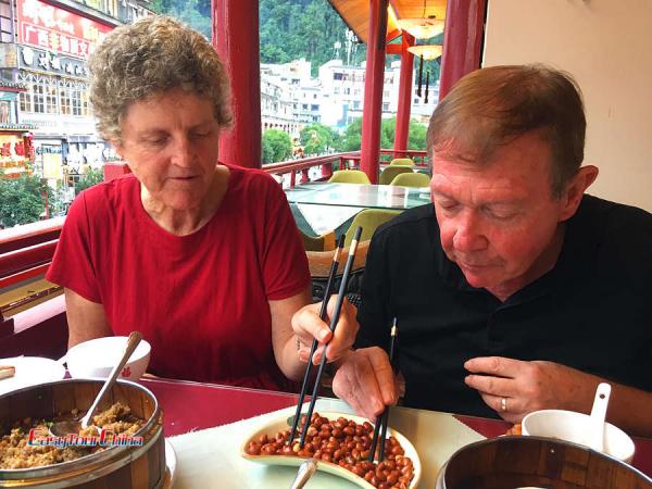 Senior travelers dine in Guilin China
