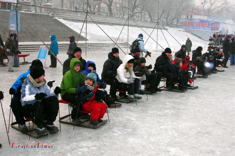 slegging in China - fun winter activities for family with kids