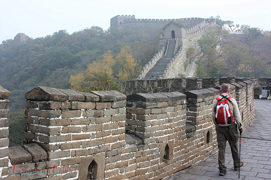 A senior traveler hike Mutianyu Great Wall