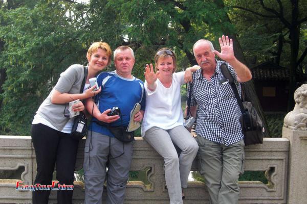 A group of senior tourists visit Yu Garden Shanghai