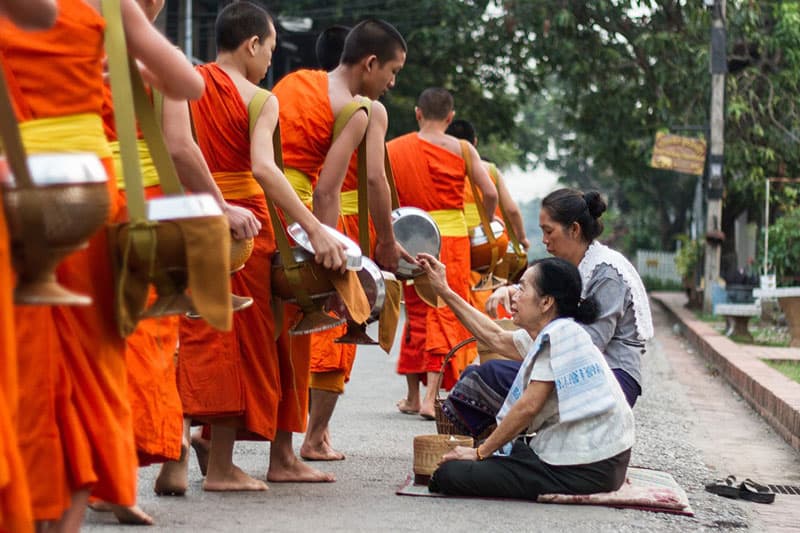 Tak Bat Morning Alms Giving Ceremony in Laos