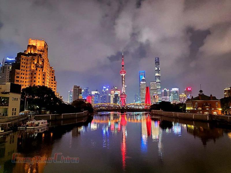 Visit the Bund at night when lights are up