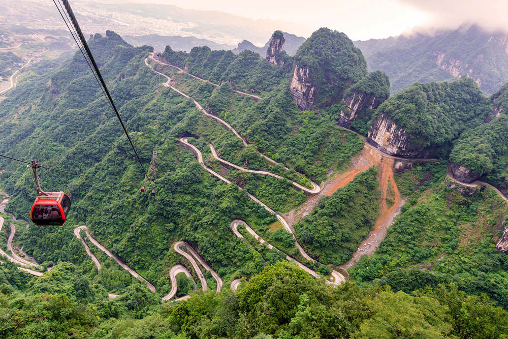 Take cable car up to the top of Tianmen Mountain