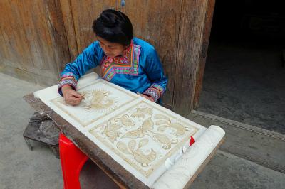 Doing traditional Chinese embroidery