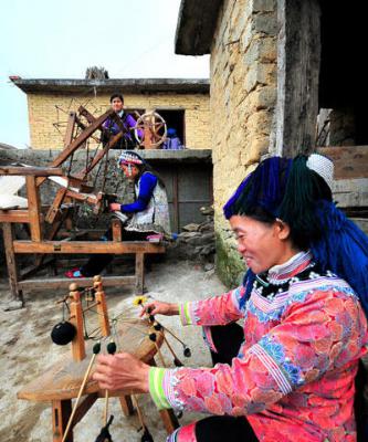 spinning women in the yuanyang rice terraced fields area, yuanyang rice